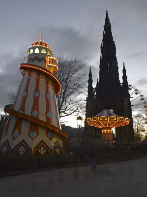 Scott Monument and fairground attractions, Edinburgh