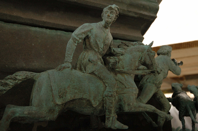 Detail of hunting scene on statue