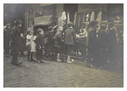 Children outside a salesman's premises, Canongate