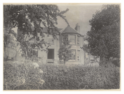 Swanston cottage, view over hedge
