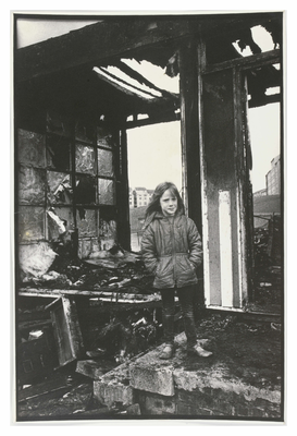 Girl standing in derelict Community Hut, Wester Hailes