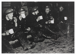 National Fire Service workers in row drinking tea
