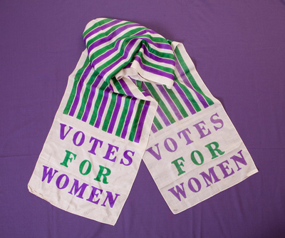 Votes for Women sash in the colours of the WSPU