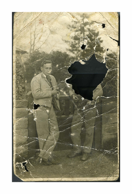Photograph postcard of two men.