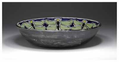 Bowl with dragonfly decoration.