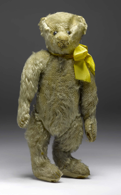 Teddy Bear with Yellow Ribbon.