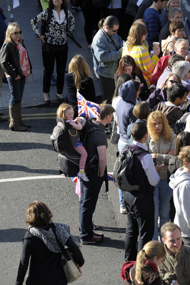 Spectators awaiting the arrival of the Olympic Torch