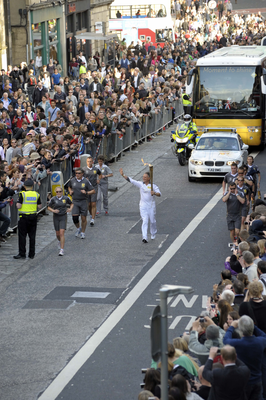 Olympic Torch runner and security officers, George  IV 