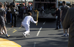 Olympic Torch Relay Runner gets on his marks