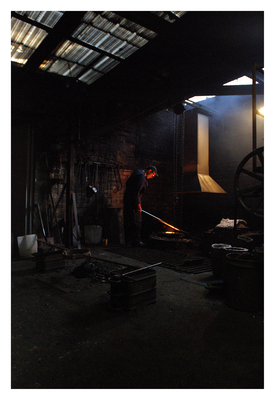 Grant checking the crucible in the second furnace