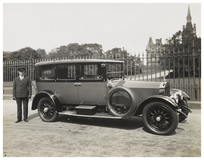 Rolls Royce car and chauffeur outside Fettes College