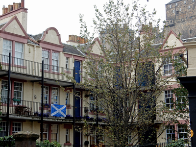 Flats at Portsburgh Square with Yes flags and posters
