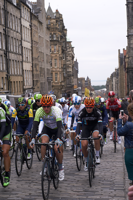 Riders cycling up the High Street