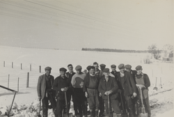 Group of rail workers stop for a photograph