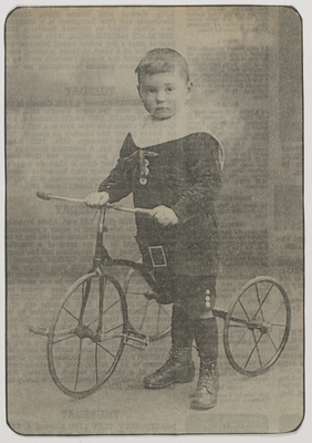 Tommy Milton with his tricycle, 1919