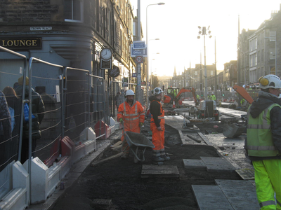 Construction work on pavement at foot of Leith Walk