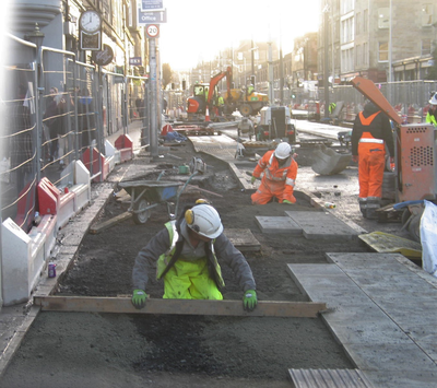 Construction works undertaking pavement laying