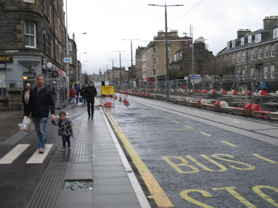 People walking down the pavement, Leith Walk